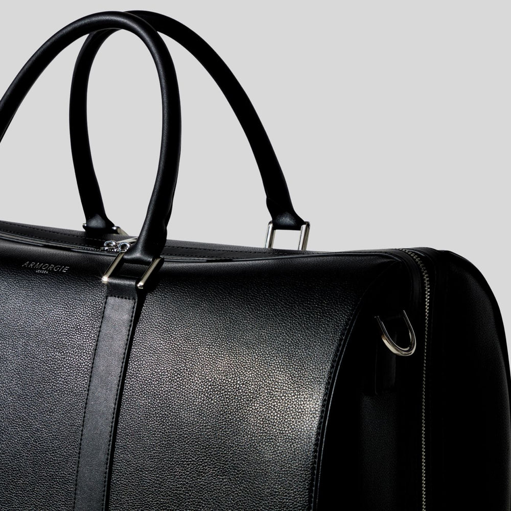 The Atlas – Luxury black leather weekend bag with lay-flat design by Armorgie London