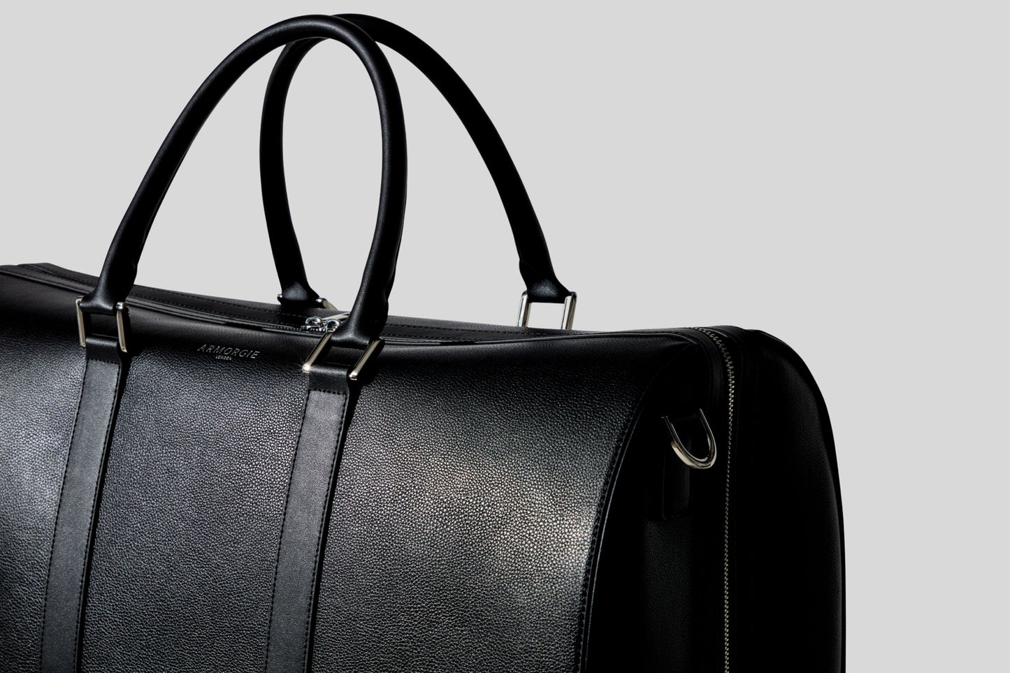 The Atlas – Luxury black leather weekend bag with lay-flat design by Armorgie London